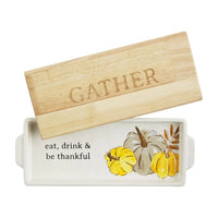 Ceramic tray with wooden lid engraved with GATHER and autumn decorations for a boho vibe