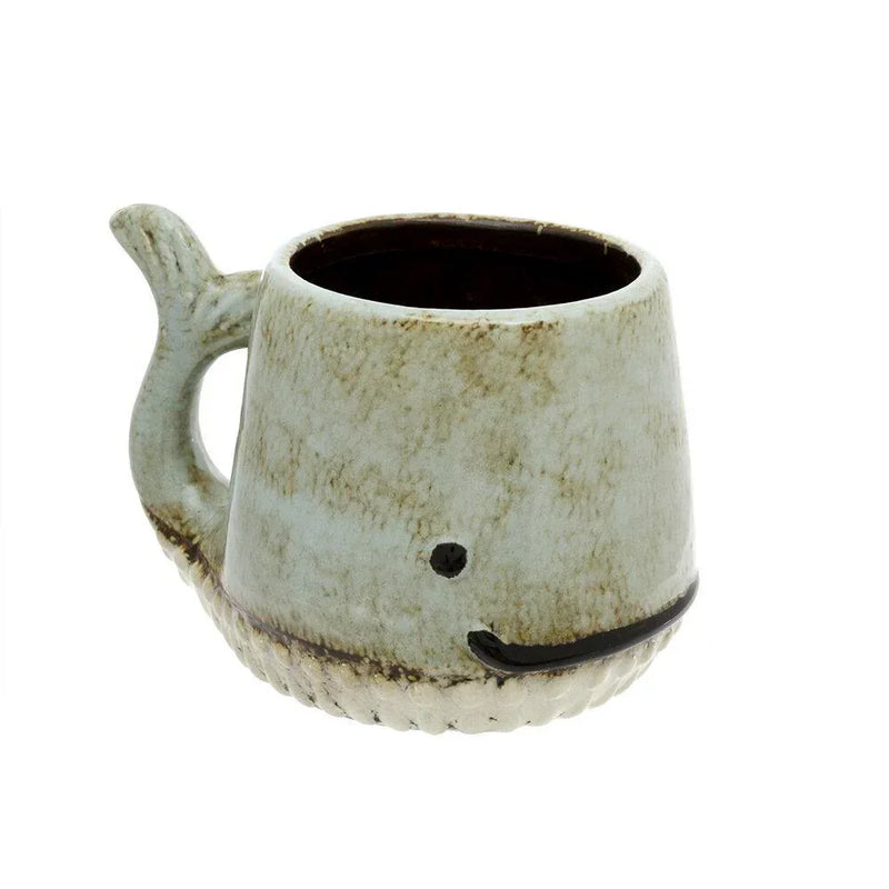 Ceramic whale mug with rustic off-white glaze, perfect for boho home decor