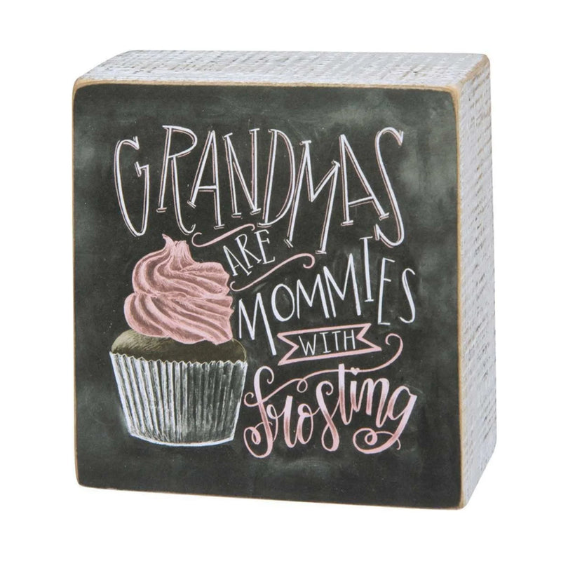 Adorable sign features wooden chalk art saying Grandmas Are Moms with a cupcake design