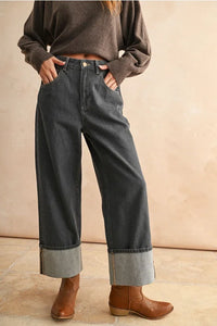 Charcoal gray high-waisted Cuffed Bottom Wash Denim with rolled cuffs and brown leather ankle boots in womens boho clothes