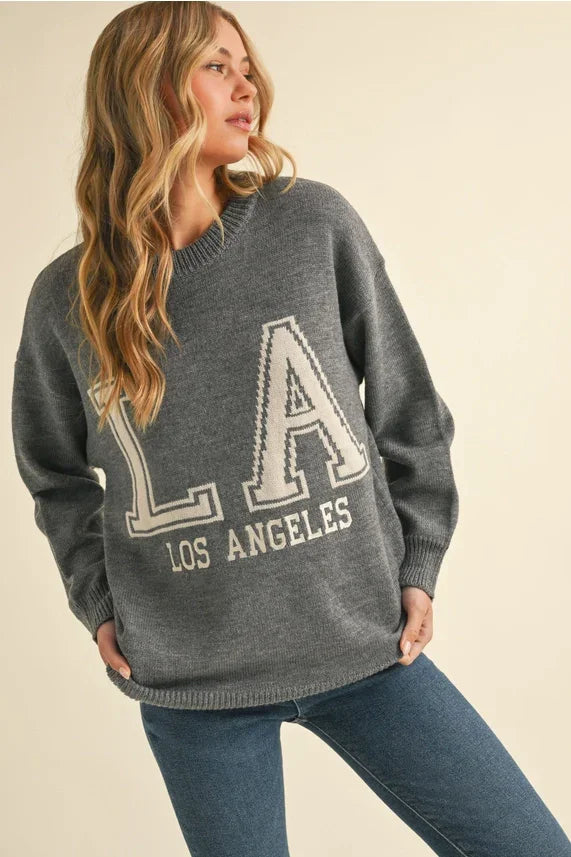 Charcoal gray Los Angeles lettering sweater top with white text and ribbed knit
