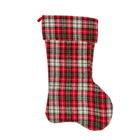 Christmas stocking featuring red, green, and white plaid fabric for a stylish holiday decor