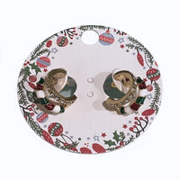 Festive candy cane sparkle clip-on earrings with red and green ornaments