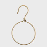 Circular metal ring with hook in brass finish for boho flowy decor designs