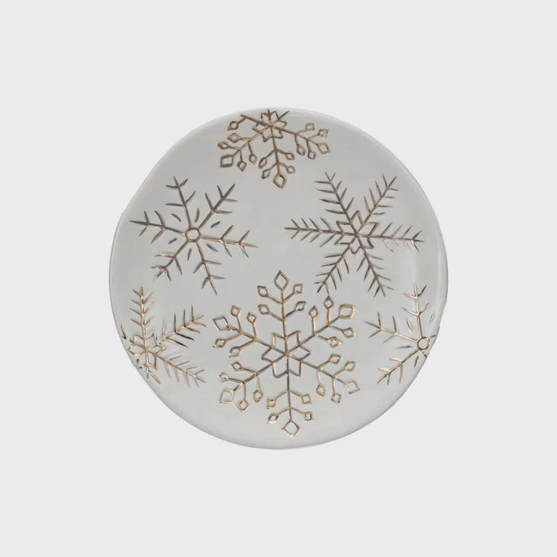 Stoneware plate featuring elegant gold electroplated snowflakes design