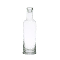 Clear glass carafe with a textured surface in a hammered glass design, 32 oz capacity