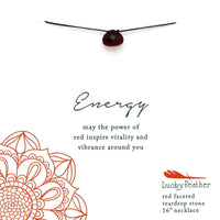 A clock adorned with a flower on the RED ENERGY COLOR POWER NECKLACE