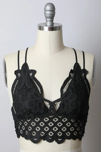 Close-up of a black Padded Crochet Lace Longline Bralette on a mannequin