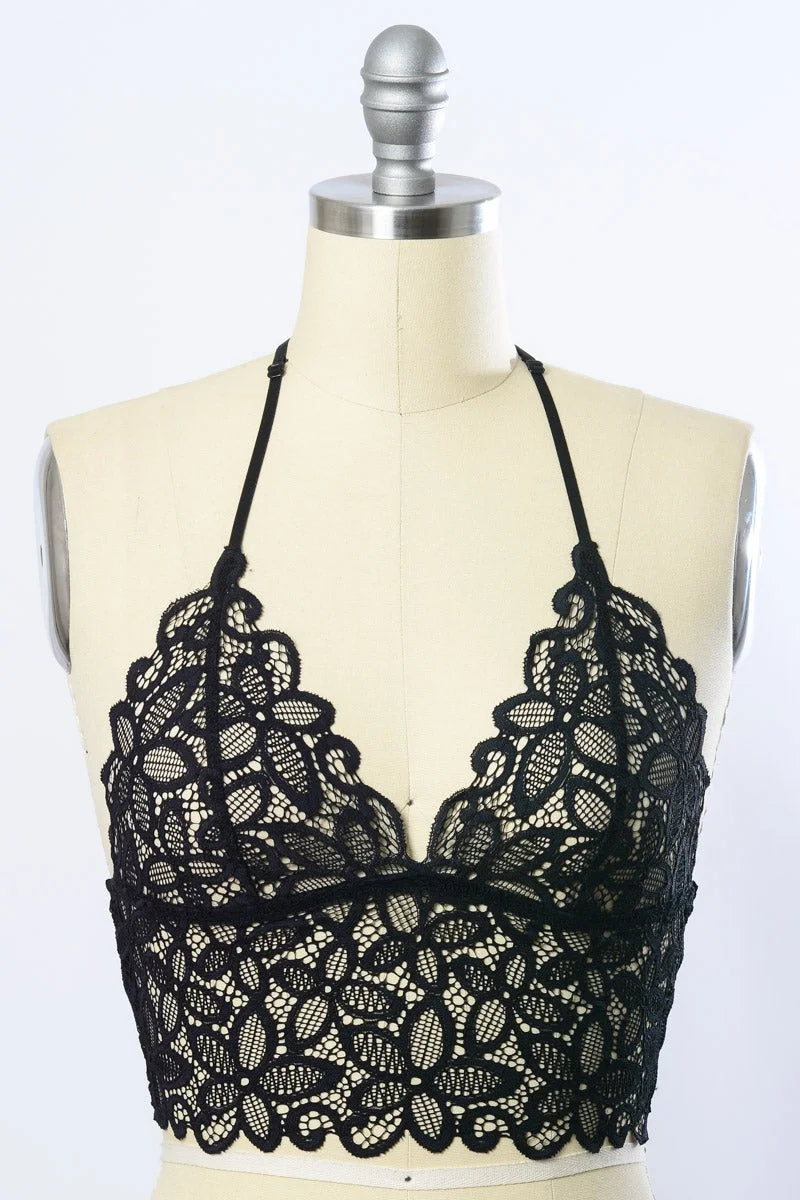 Close up of RACERBACK FLOWER LACE BRALETTE PADDED on a mannequin, showcasing floral design