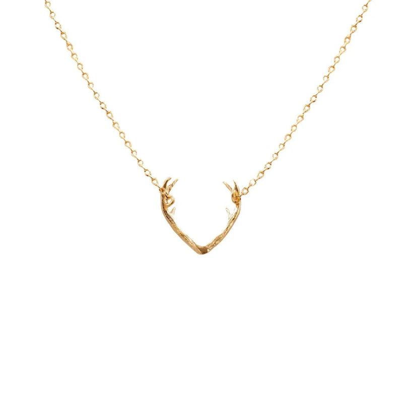 Close-up of a stylish Deer Antler Necklace on a chain showcasing natural elegance