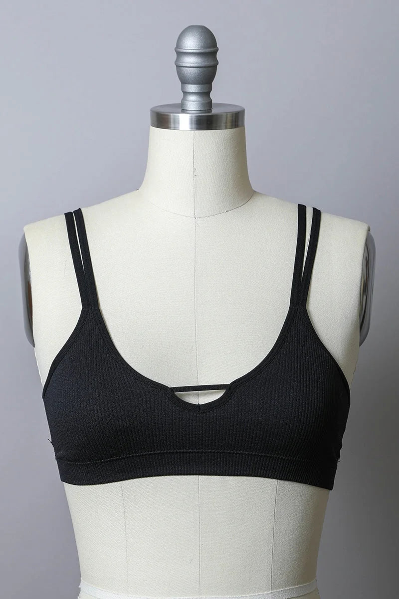 Close-up of PADDED RIBBED KEYHOLE FRONT BRALETTE on mannequin against white background