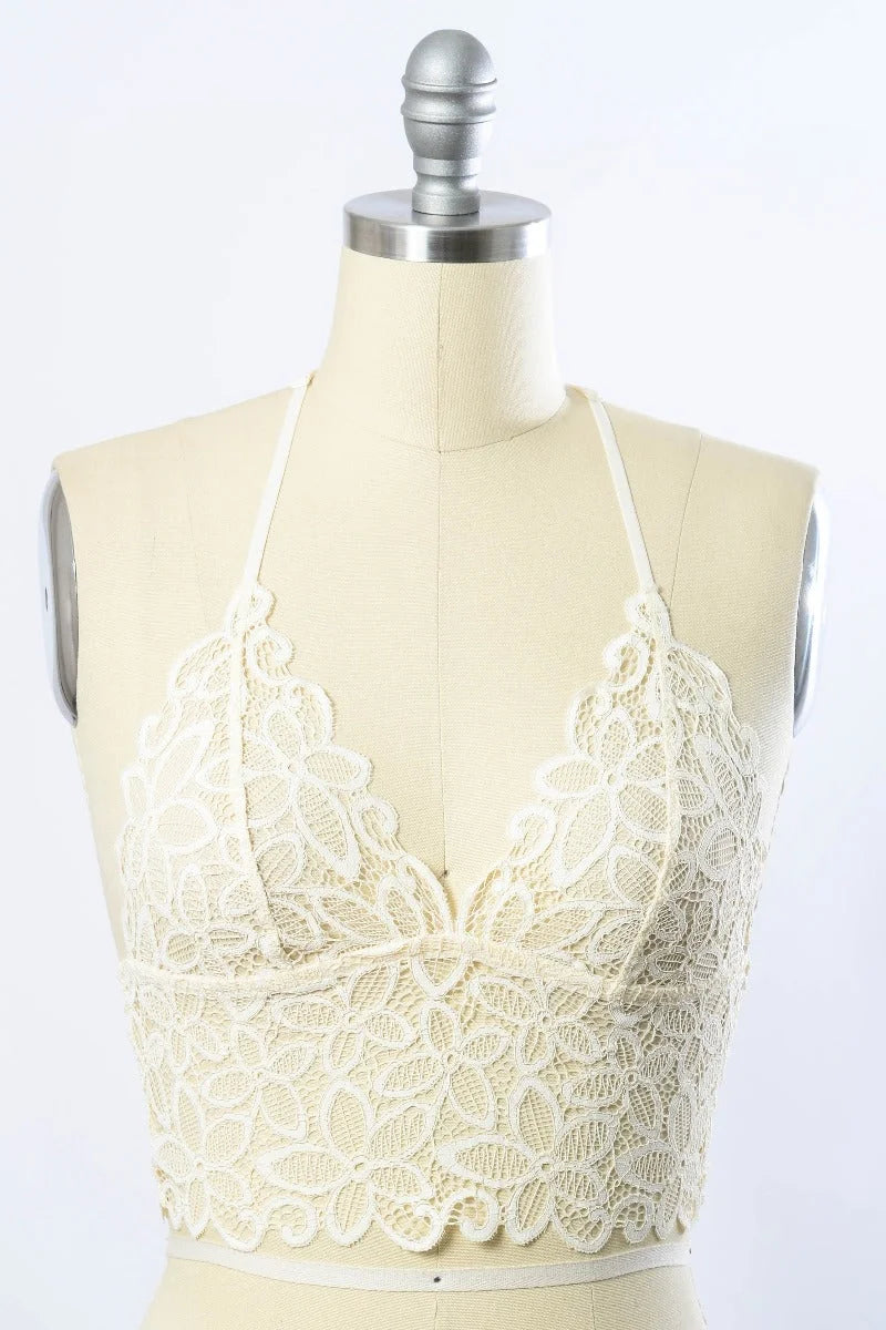 Close-up of Racerback Flower Lace Bralette Padded on a mannequin against a white background