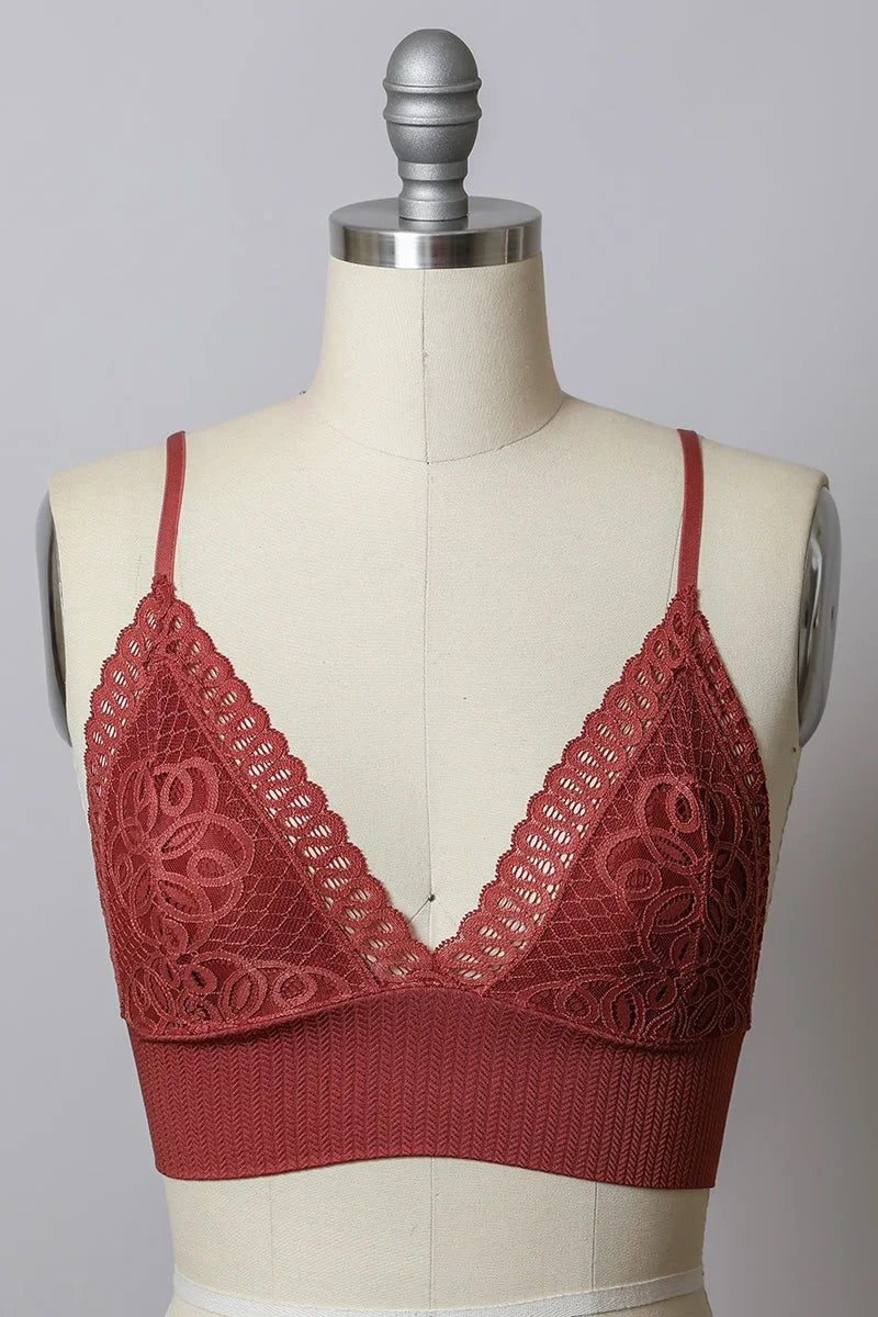 Close-up of a dress on a mannequin featuring a Waisted Loop Lace Seamless Brami Bralette