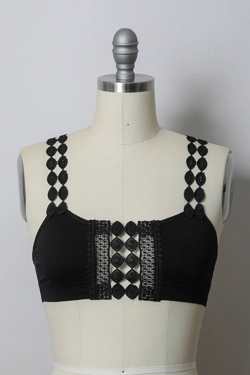 Close-up of a mannequin torso featuring the Bohemian Eye Lace Applique Bralette