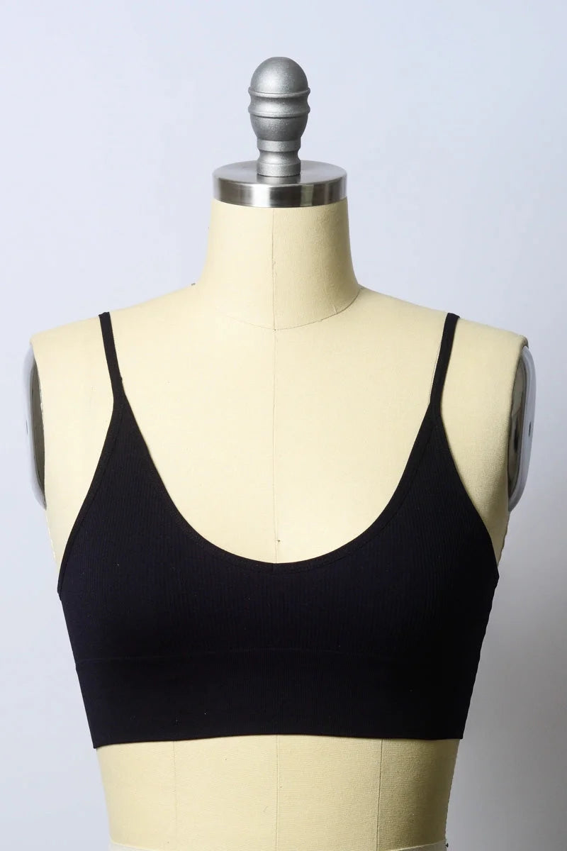 Close-up of a mannequin torso featuring a low back seamless bralette to stay comfy