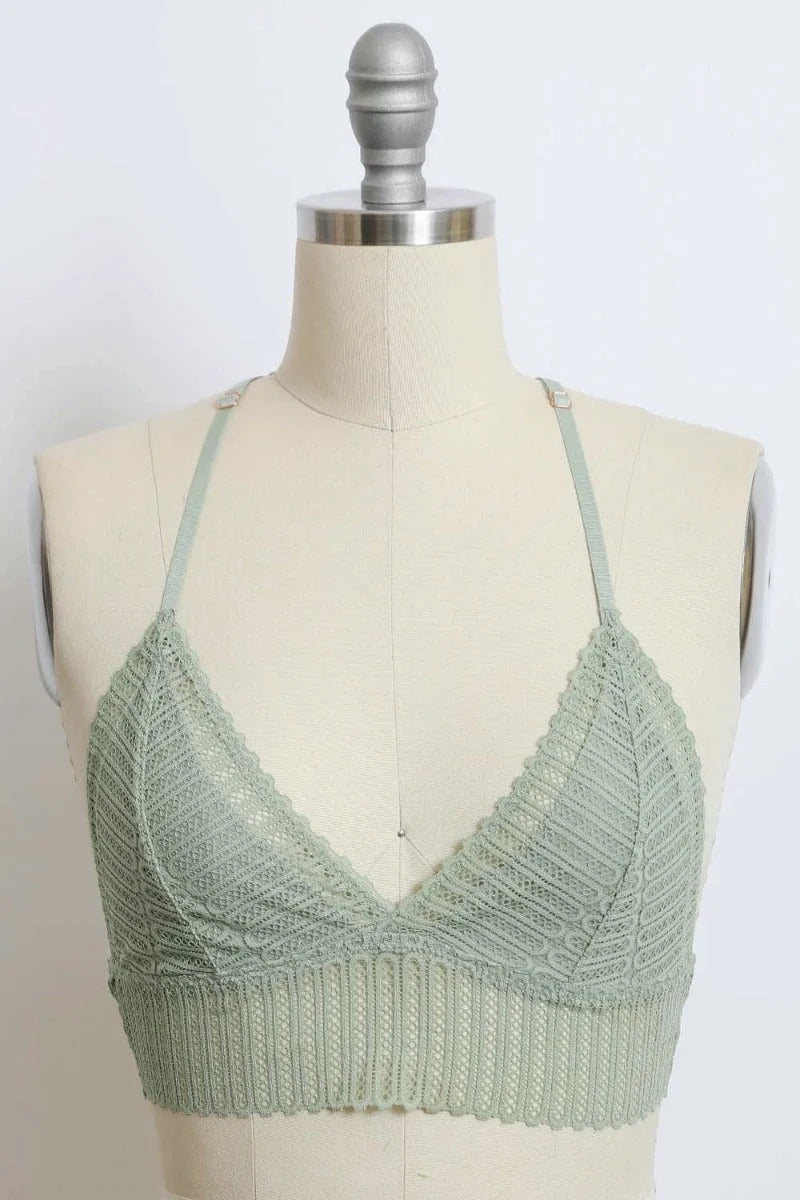 Close-up of a mannequin torso showcasing a Ribbed Lace Boho Racerback Bralette