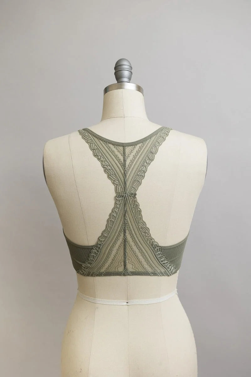 Close-up of a mannequin torso showcasing the Seamless Front Lace Racerback Bralette