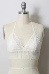 Close-up of a mannequin showcasing a Ribbed Lace Boho Racerback Bralette in white