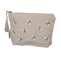 Close-up of BEE YOU TIFUL ZIPPER POUCH adorned with charming bees for a stylish look