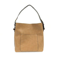 Close up of a tan vegan leather Classic Hobo handbag with a black handle