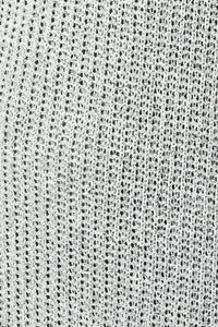 Close-up view of woven fabric featuring a knit pattern on a flowy boho maxi dress