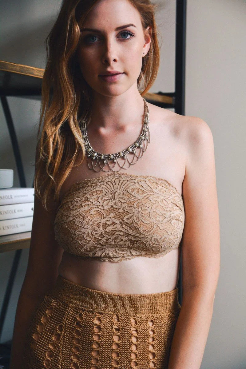 Close-up of a woman in a brown top and skirt showcasing Daisy Lane Lace Boho Bandeau