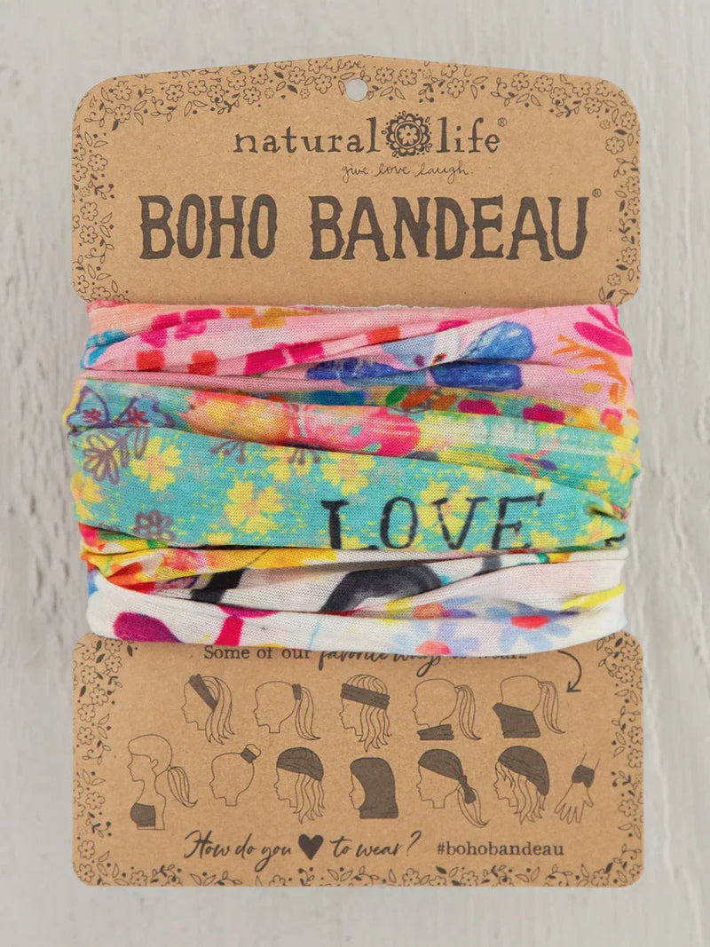 Colorful Boho headbands in a display, showcasing the FULL BOHO BANDEAU - RAINBOW LOVE