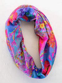 Colorful floral infinity scarf as part of women’s boho chic clothing by Shop Daisy