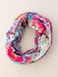 Colorful floral infinity scarf from Shop Daisy, ideal for women’s boho chic clothing