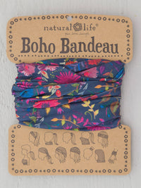 Colorful floral patterned fabric headband in branded packaging for Boho Bandeau Navy Wild Flowers