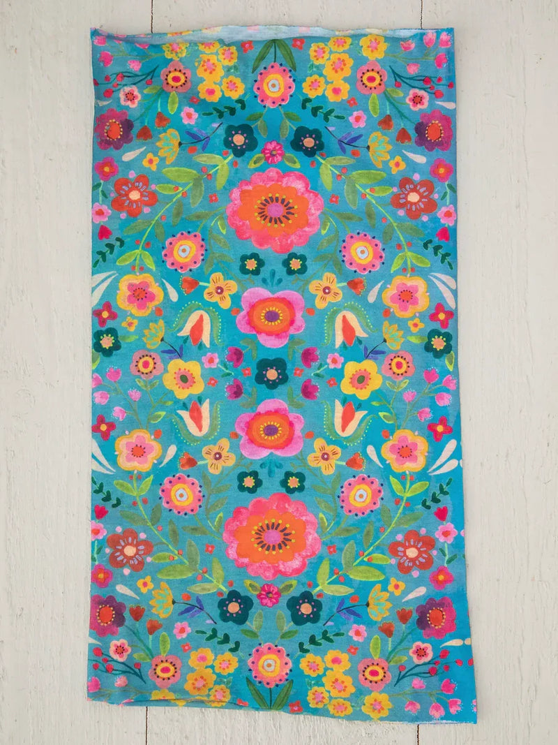 Colorful floral beach towel with vibrant teal, perfect for a boho free spirit