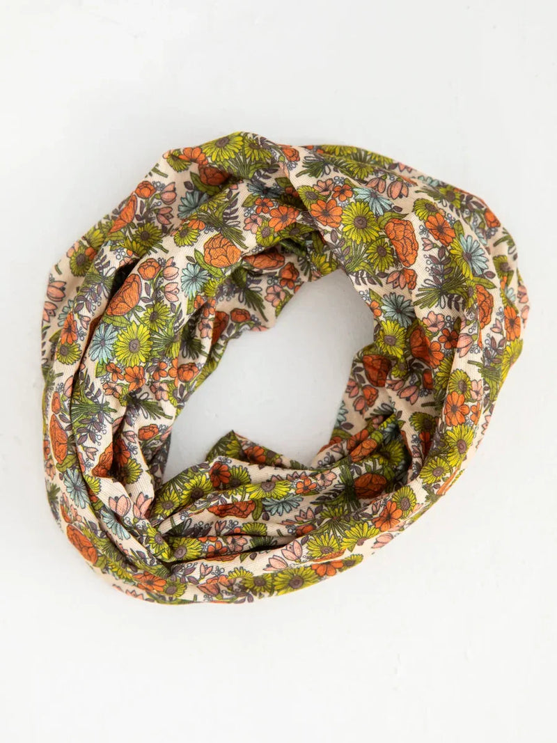 Colorful floral infinity scarf showcasing boho retro daisies design for free spirit style