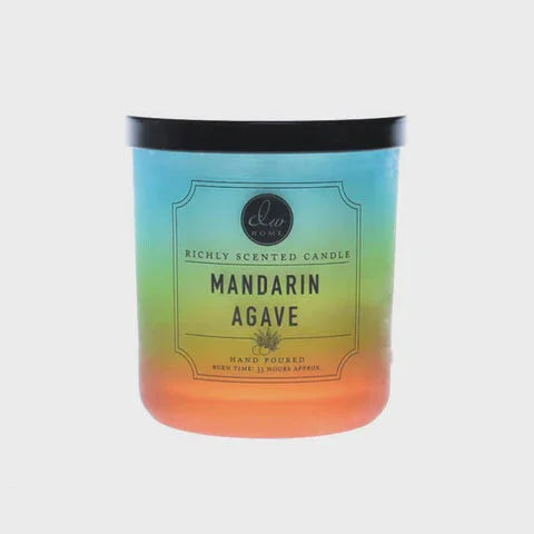 Colorful gradient jar candle labeled Mandarin Agave for a boho free spirit aesthetic