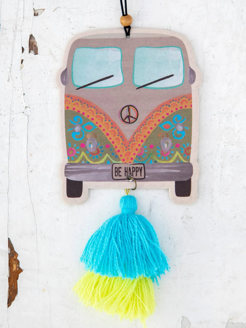 Colorful boho hippie-style van air freshener with peace symbol and tassels