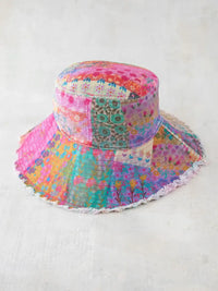 Colorful watercolor patchwork bucket hat from Shop Daisy for women’s boho chic clothing