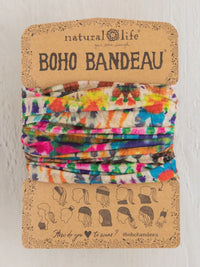 Colorful boho bandeau headband in Fuchsia Marigold Tie-Dye with branded packaging