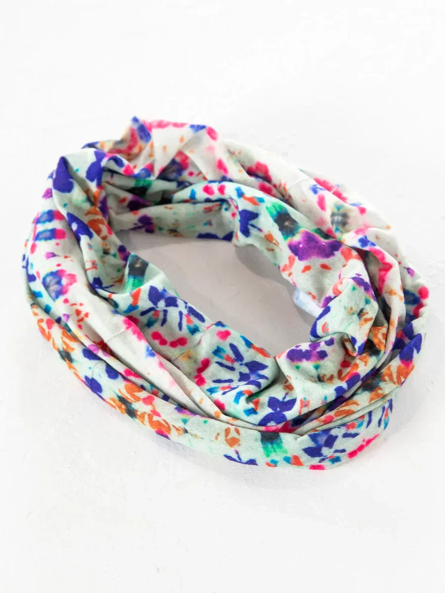 Colorful patterned fabric scarf showcasing a vibrant splatter design for free spirit style