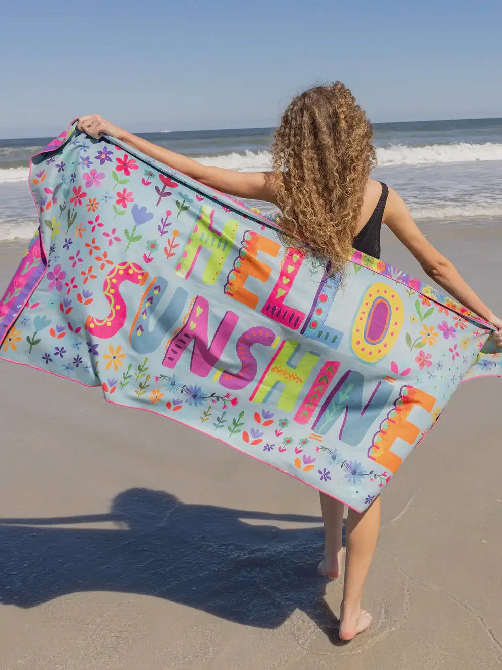 Colorful Hello Sunshine beach towel from Jacksonville Beach, perfect for microfiber yoga