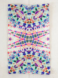 Colorful boho tapestry with vibrant blues, pinks, and purples for free-spirited style