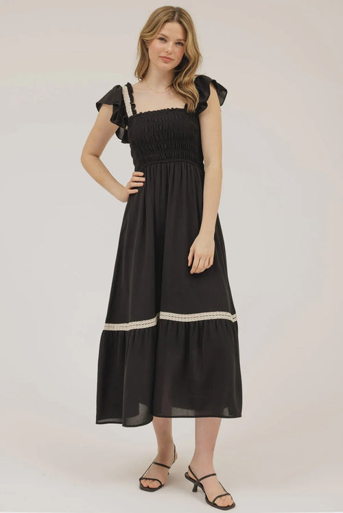 Black smocked ruffle midi dress with cream trim from Contrast Detail Smocked Ruffle Midi Dress