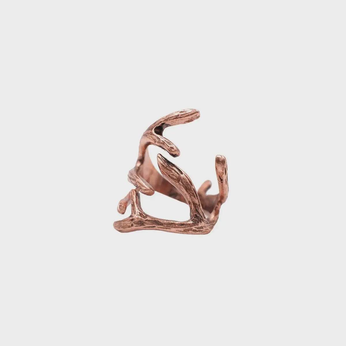 Copper-colored abstract deer antler ring featured in the Rose Gold Deer Antler Ring collection