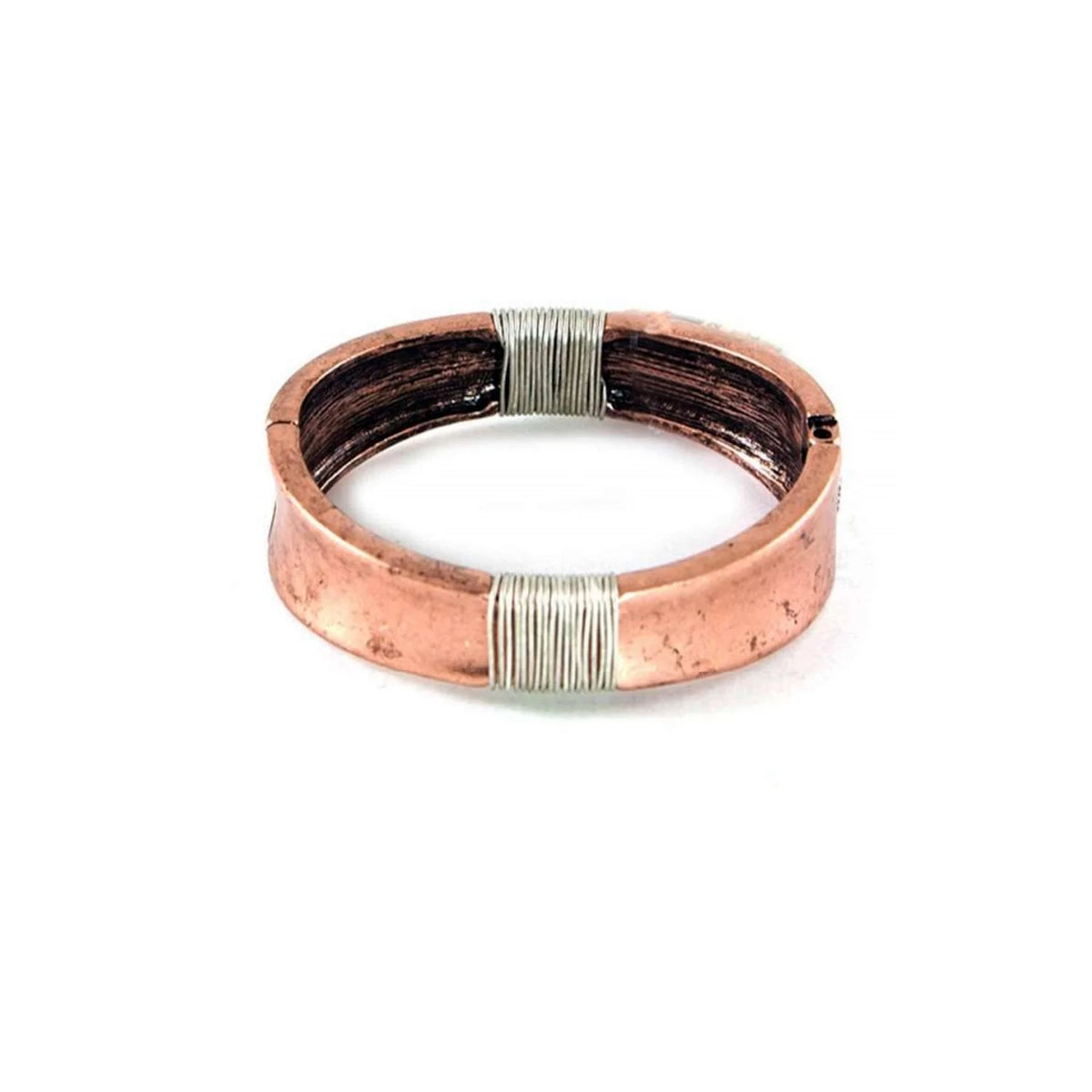 Copper and silver ring with a thin band from Daisy Lane’s boho copper bracelet collection