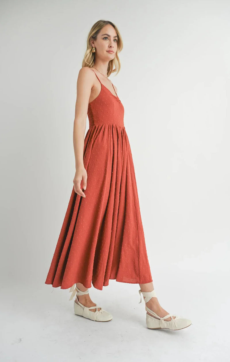 Coral-colored Collectible Sweetheart Neckline Dress with spaghetti straps and flowy skirt