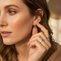 Wanderlust Jewels earring adventure: coral drop earrings with gold accents and gemstones