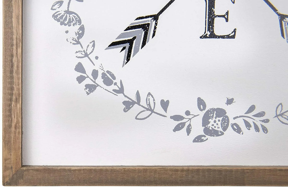 Corner detail of WOOD FRAMED LOVE AND ARROWS PRINT showcasing floral designs in gray tones