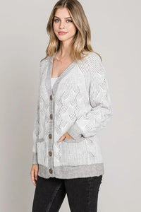 Cozy gray and white patterned cardigan sweater from Shop Daisy, ideal for women’s boho chic clothing