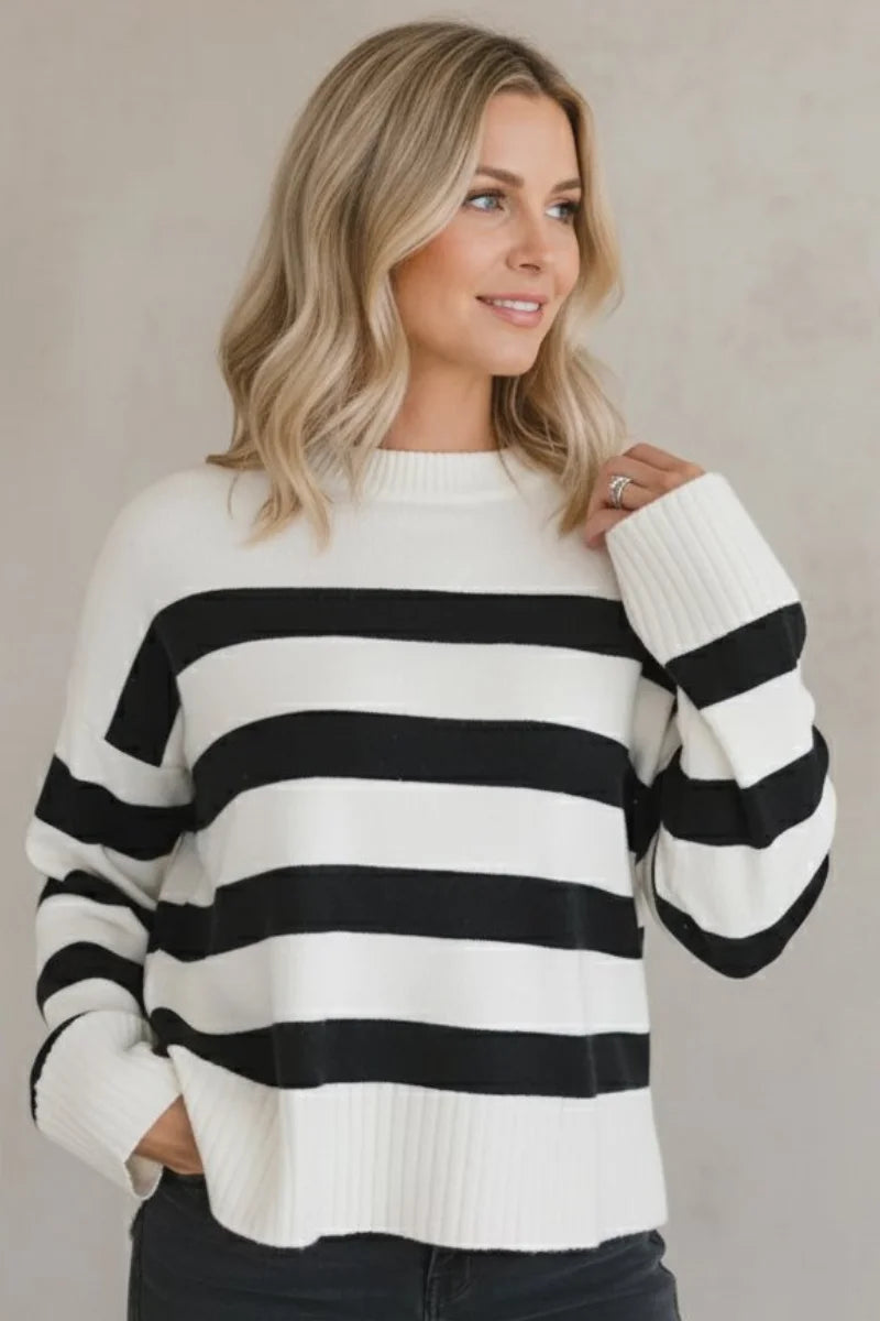 Cozy striped crew neck sweater in black and white stripes