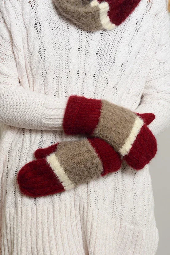 Cozy red and beige striped warm mittens made of ultra soft mohair paired with a sweater