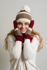 Person wearing ultra soft mohair wide stripe warm mittens with cozy winter accessories