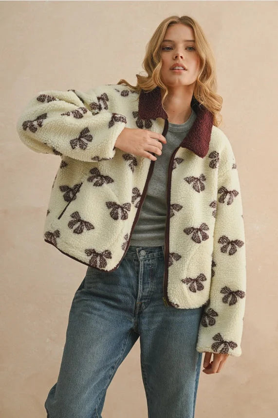 Cream and brown bow pattern sherpa jacket with a maroon collar, stylish sherpa jacket